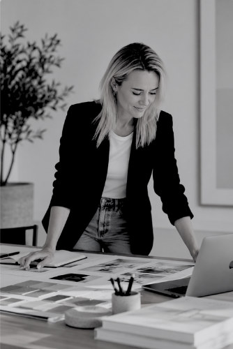 Natalie Jackson reviewing printed material on a desk during a marketing audit